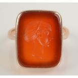 A 9ct gold ring set a carnelian intaglio, size J.