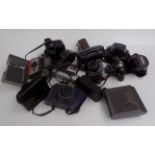 Miscellaneous cameras to include a Praktica Super TL, Petri FT, Ricoh KR-10 Super, Canon Canonet,