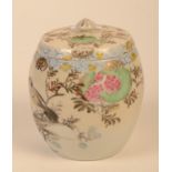 A Japanese porcelain drum style pot and cover, 20th century, with a bird perched on a branch,