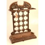 A Victorian cast iron umbrella stand, with two sections and a lift out tray, height 62.