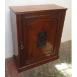 An Edwardian mahogany side cabinet, with a single arched panelled door on plinth base, height 86.