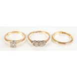 Two 18ct gold rings and a 14ct gold ring, 5.3g.
