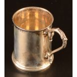 A late Victorian christening mug with plain body flared foot and cast handle, 5.7oz, Sheffield 1870.
