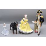 A Royal Doulton figure 'The Captain' HN 2260, a Beswick figure of a rottweiler,