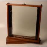 An oak framed, revolving observation box, with glazed panels to front and rear, height 56cm,