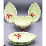 A Carlton Ware salad bowl, leaf moulded on three legs in the form of lobsters,