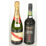 A bottle of G.H.Mumm Cordon Rouge Champagne and a bottle of Croft Triple Crown ruby port.