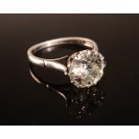 An impressive diamond and platinum solitaire ring the Old European cut diamond of approximately 3.