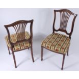 A pair of Edwardian inlaid mahogany dining chairs,