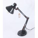 A black anglepoise lamp, height 60cm, diameter 16cm.