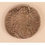 A William III shilling recovered from the wreck of The Association with original certificate,