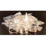 Silver and silver coloured metal jewellery including a quantity of silver charms and charm