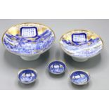 A set of five Chinese blue and white gilt decorated bowls,