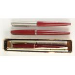 A Parker red Slim Fold fountain pen with 14ct gold nib, boxed,