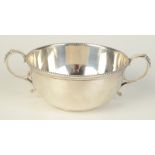 A James Dixon twin handled silver bowl, Sheffield 1945, with beaded border, 5.1oz.