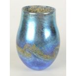A Norman Stuart Clarke studio glass vase, with swirling decoration to an iridescent blue ground,