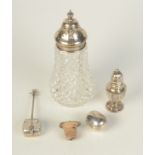 A silver mounted cut glass sugar caster, together with four other pieces.