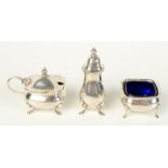 A three piece silver condiment set, 3.3oz, with blue glass liners.