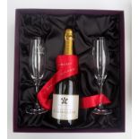 A bottle of Highgrove Cuvee champagne and a pair of flutes in original presentation box and an