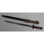 A bayonet, the blade inscribed with a crown above 190 Wilkinson, length 55.5cm.