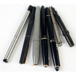 A Conklin Crescent-filling fountain pen in black, lacks lid, together with various other pens.