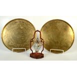 A pair of Chinese brass circular trays,