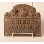 A reproduction cast bronze plaque for A Siebe, Denmark Street, London, 15.5 x 17.8cm.