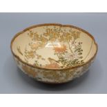 A Japanese Satsuma circular pottery bowl,