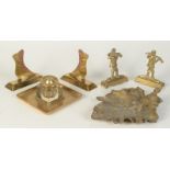 A brass inkwell, an Art Nouveau gilt metal dish and two pairs of hearth ornaments.