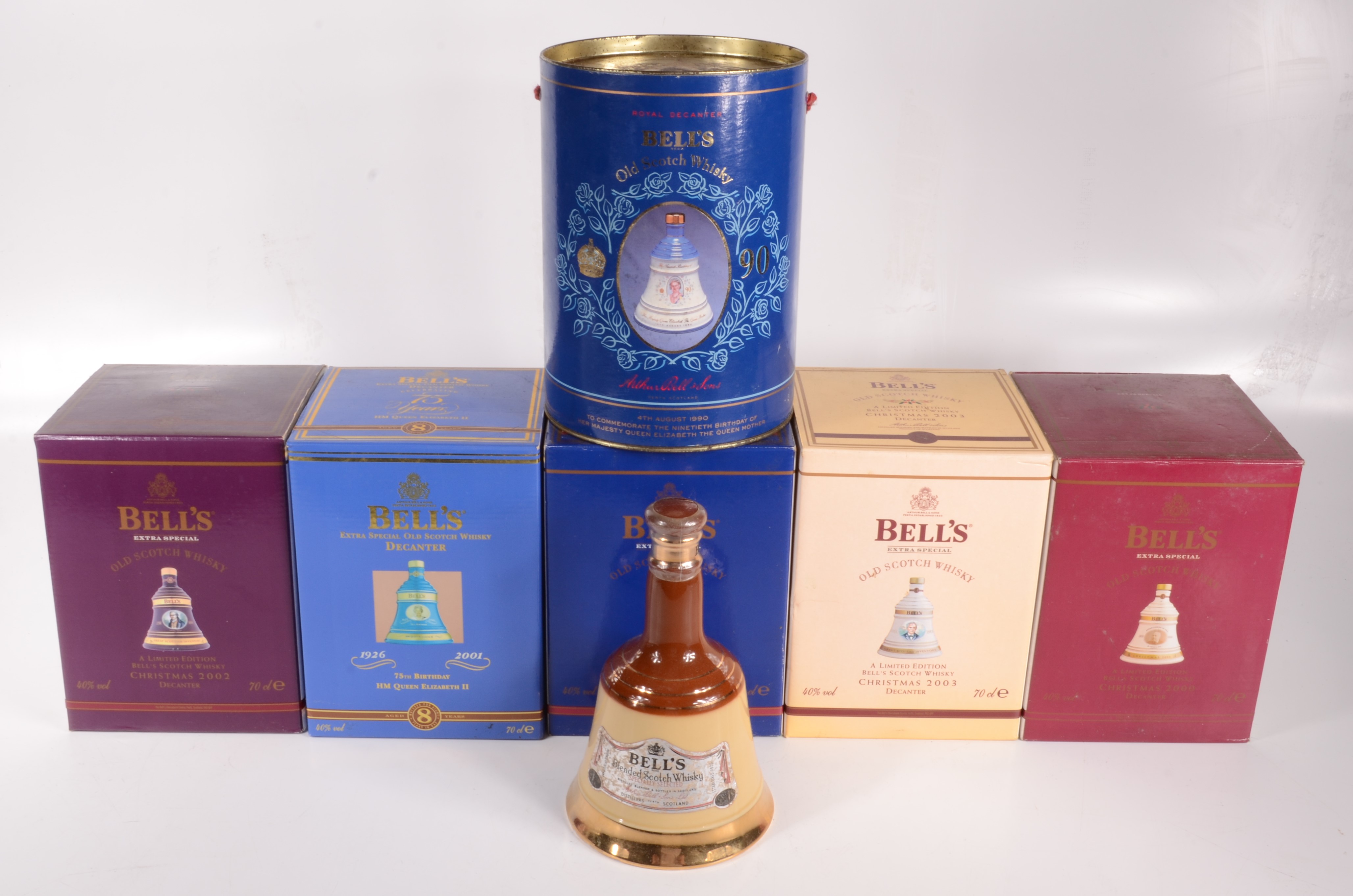 Four boxed Bell's limited edition Scotch whisky decanters, aged 8 years, Christmas 2000, 2001,