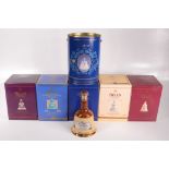 Four boxed Bell's limited edition Scotch whisky decanters, aged 8 years, Christmas 2000, 2001,