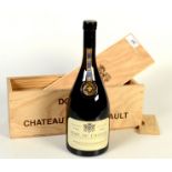 A bottle of Marc du Chateau, 10 ans d'age, Domaine du Chateau de Meursault, in original wooden box.