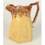 A treacle glaze pottery hexagonal jug, 19th century, the body decorated with musicians, height 21cm.
