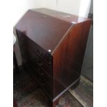 A George III mahogany bureau,