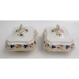 A pair of English porcelain tureens and covers, with gilt fruit and leaf decoration, height 16cm,