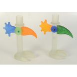 Two Barowski studio glass candlesticks, in the form of stylised cockerels, with original stickers,