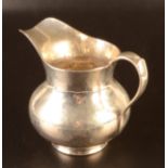 An Italian 800 standard hammered silver jug, maximum height 13.7cm, 380g.