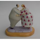 A limited edition resin figural group by Sara Jane Szikora, modelled as a kissing couple, 97/500,