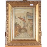 A needlepoint picture of a street scene, circa 1900, in ornate gilt frame and glazed, full size 52.