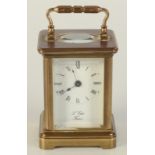 A French miniature brass carriage clock, the white rectangular dial inscribed 'L' Epee, France',