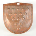 A copper Cornish arms plaque, mounted on an oak shield, height 48cm, width 45.5cm.
