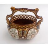 A Herculaneum pottery basket, RD No.64675, height 20cm, width 21cm.
