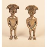 A pair of metal figures of naked men wearing naval style hats, height 16.5cm.