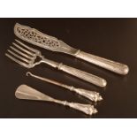 A pair of fish servers, a button hook and a shoe horn each with filled silver handles.