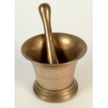 A bronze pestle and mortar, late 18th/early 19th century, height of mortar 14cm, diameter 16.8cm.