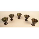 A set of five Chinese black lacquer and mother of pearl 'laque burgaute' style stem cups,