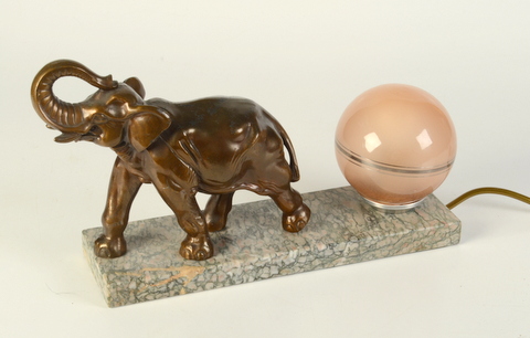 A French Art Deco elephant mounted table lamp, with globular shade on a marble plinth, height 20cm,