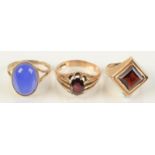 Three 9ct gold stone set rings, 16.9g.