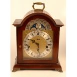 A German bracket clock with triple train movement and lunar arch, the dial signed Hernle.