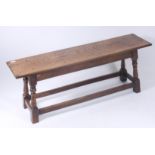 An oak long stool, late 17th century style,